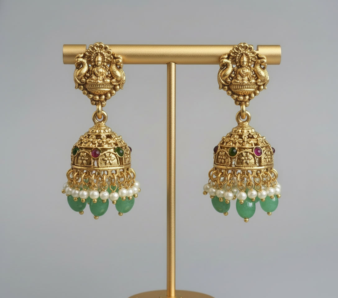 This exquisite handcrafted gold necklace set embodies the grandeur of South Indian temple jewelry.