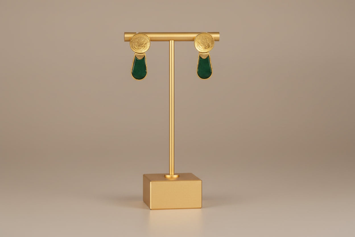 Antique gold coin necklace with emerald green drop accents, maroon stone detailing, and matching stud-style earrings