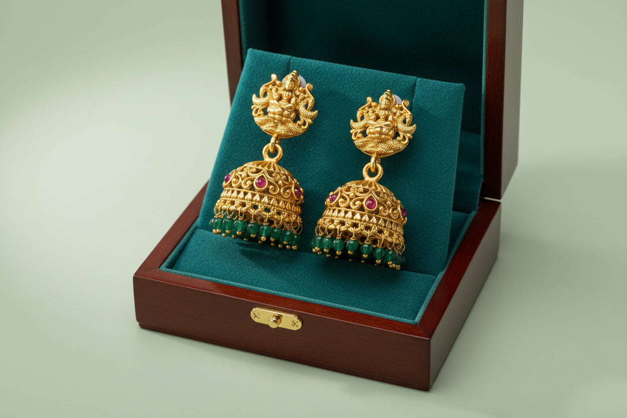 This regal necklace set is a celebration of temple artistry and gemstone beauty.