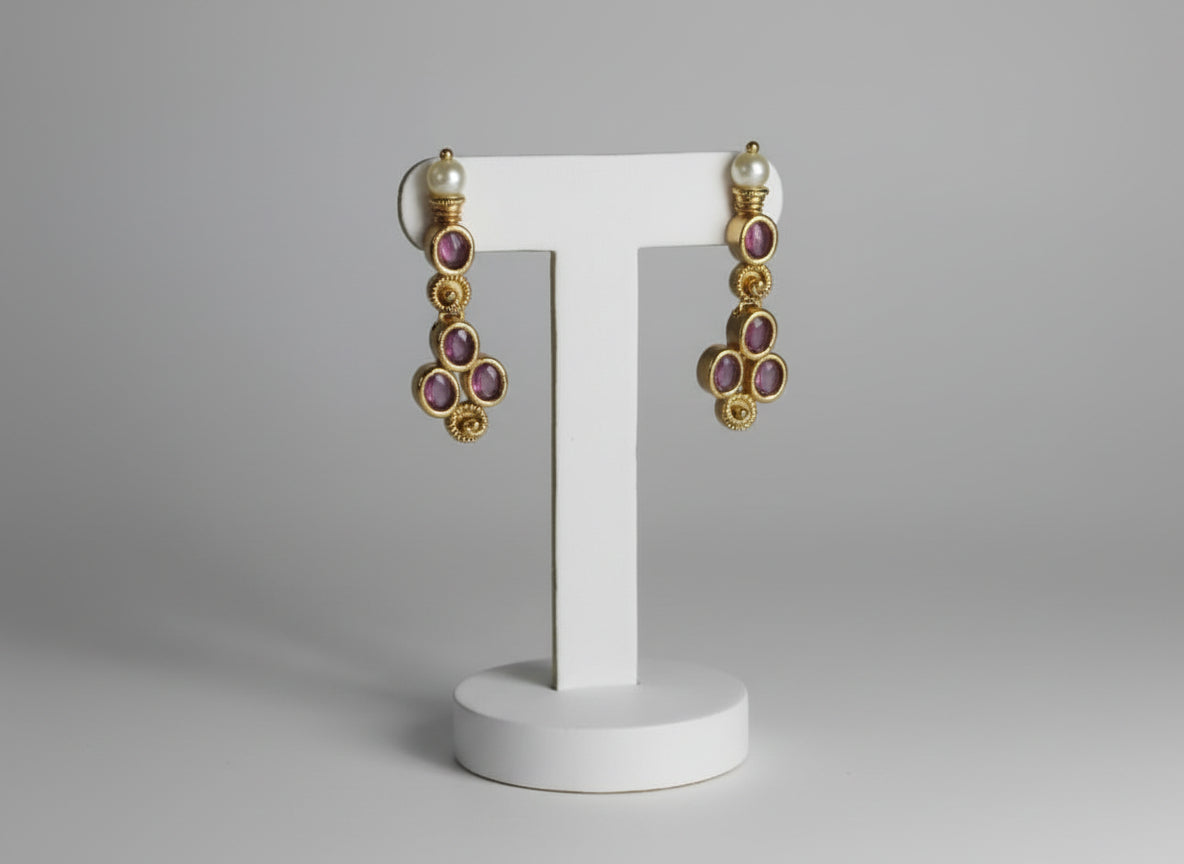 Antique gold necklace with layered pearl strands, pink/magenta kemp stone accents, and matching floral drop earrings