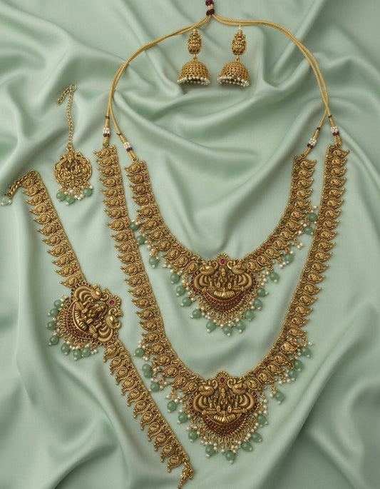 antique gold bridal combo set with layered necklace, waist belt, jhumkas & maang tikka featuring mint-green bead drops
