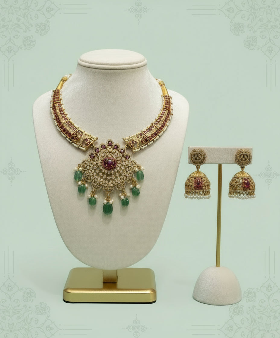 Jewelry set with necklace and earrings on a white mannequin and stand against a light green background
