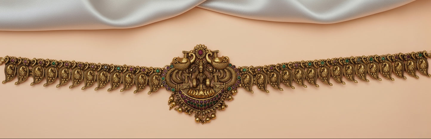 Gold necklace on a white background