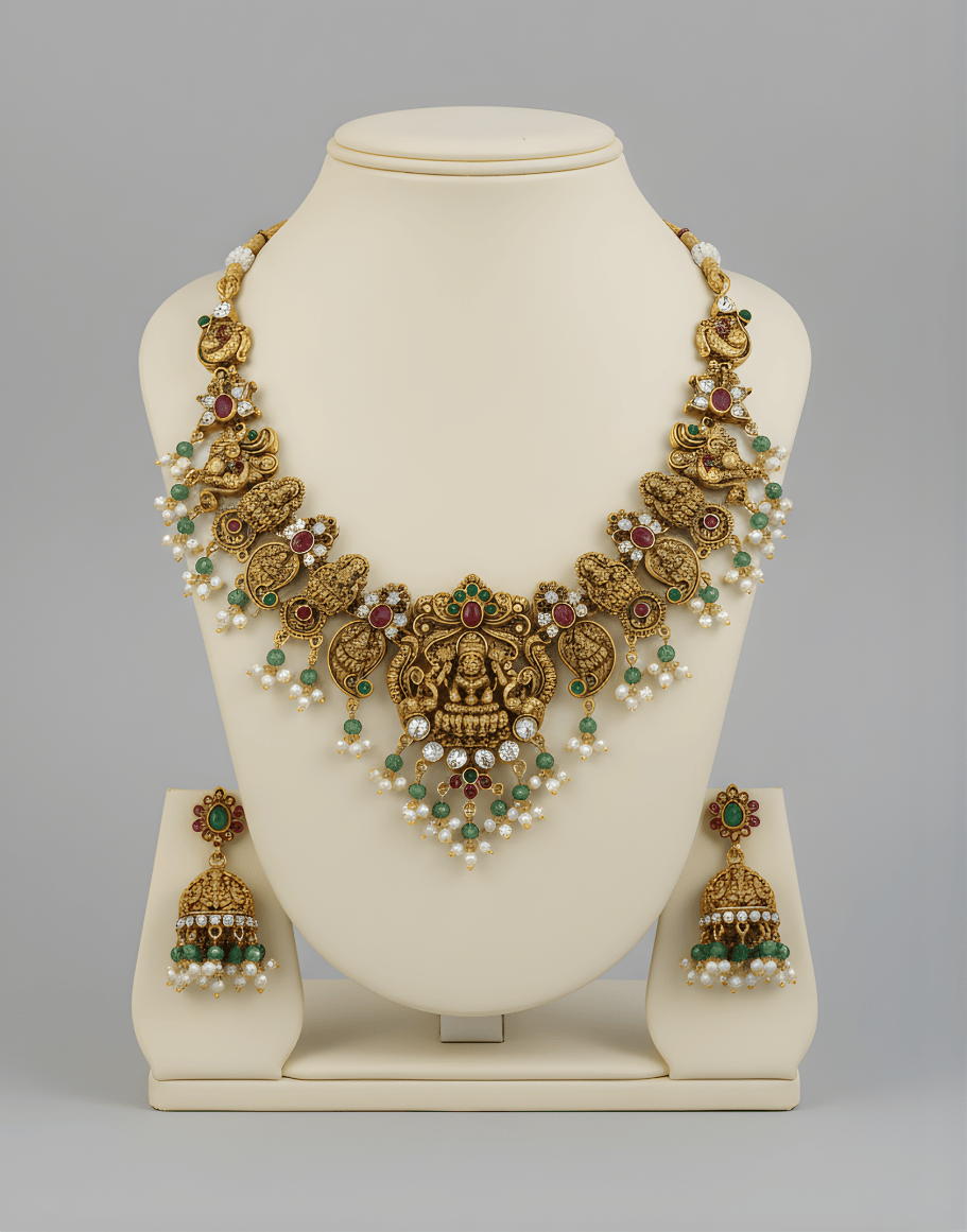 Decorative necklace on a white stand with a plain background