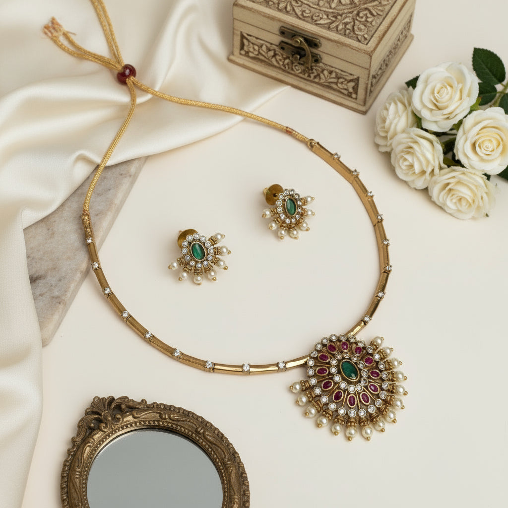 Jewelry set with necklace and earrings on a white fabric background 