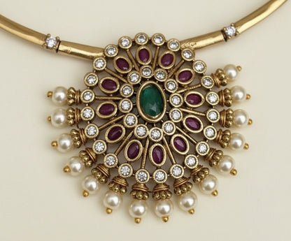 Ornate necklace with stones and pearls on a beige background