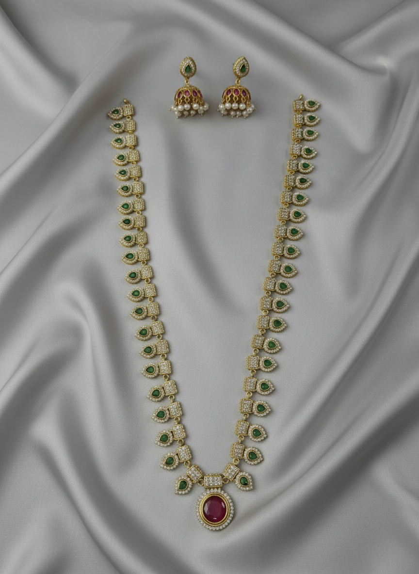 Jewelry set with necklace and earrings on a gray background
