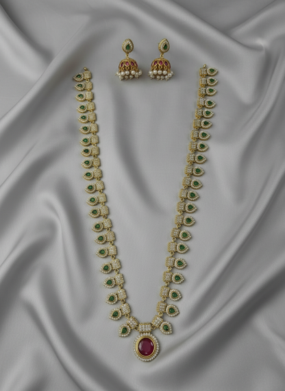Jewelry set with necklace and earrings on a gray background