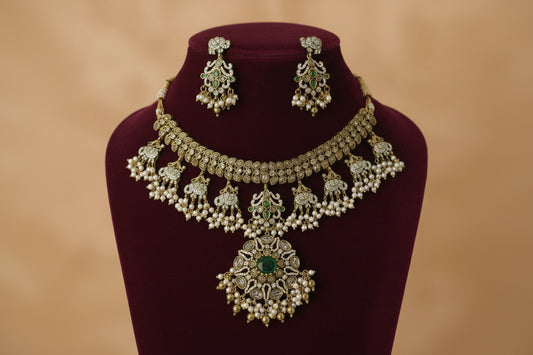 Ornate necklace and earrings set on a mannequin bust with a neutral background
