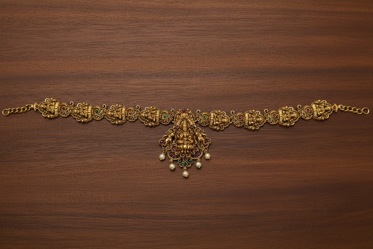 This exquisite handcrafted gold necklace set embodies the grandeur of South Indian temple jewelry.