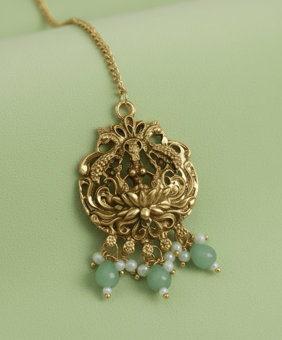 antique gold bridal combo set with layered necklace, waist belt, jhumkas & maang tikka featuring mint-green bead drops