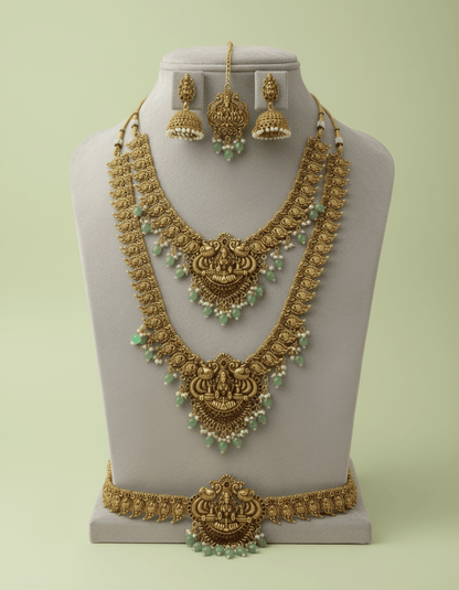 antique gold bridal combo set with layered necklace, waist belt, jhumkas & maang tikka featuring mint-green bead drops