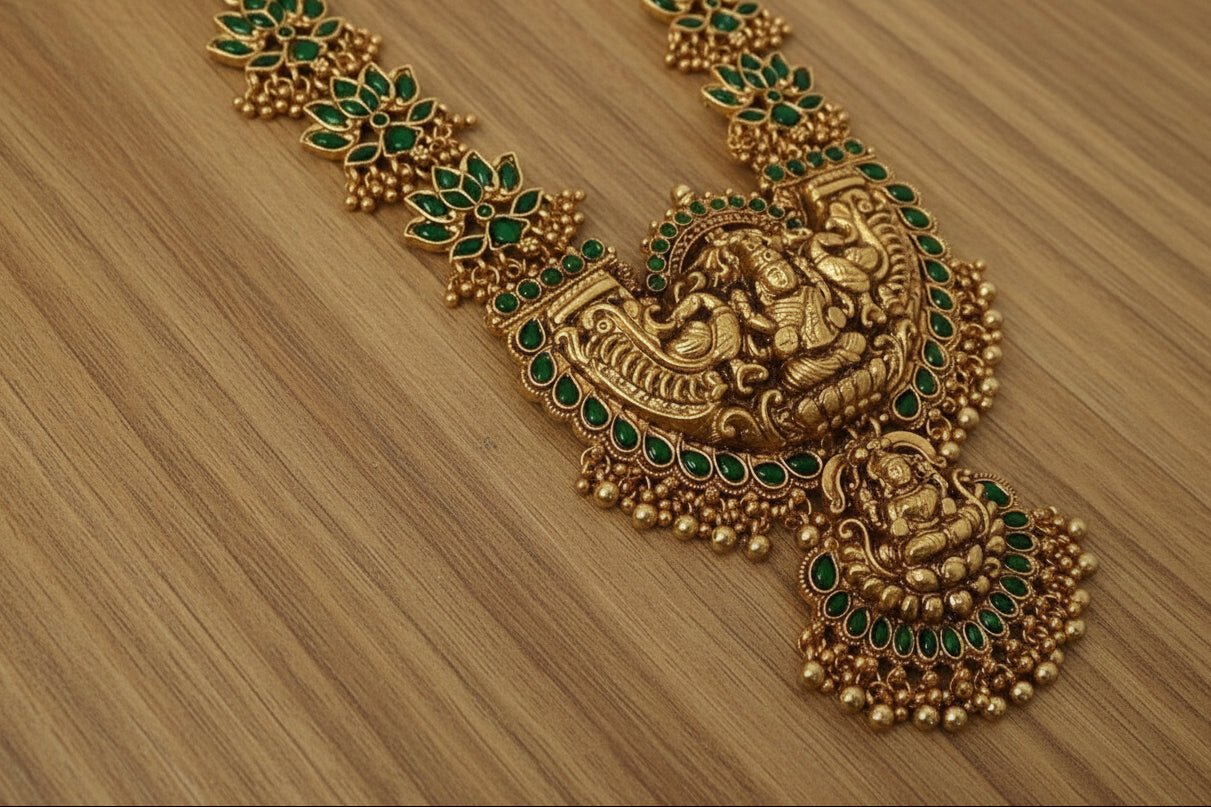 Celebrate timeless tradition with this temple jewelry set, featuring a majestic necklace and matching earrings.