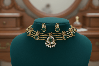 Elegant heritage choker necklace set featuring green stones, green and white centerpiece, and pearl fringe.