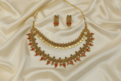 antique gold two-layer necklace with pink mango-shaped stone drops, pearl detailing, and matching drop earrings