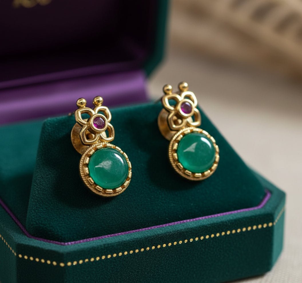 Choker necklace with green stones, pink-green pendant, and pearl drops, paired with matching earrings.